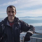 /attachments/trips/bye-bye-california-welcome-switzerland/man-standing-in-front-of-swiss-mountains-at-uetliberg-zurich_hu_5424a1a584ff48ae.webp
